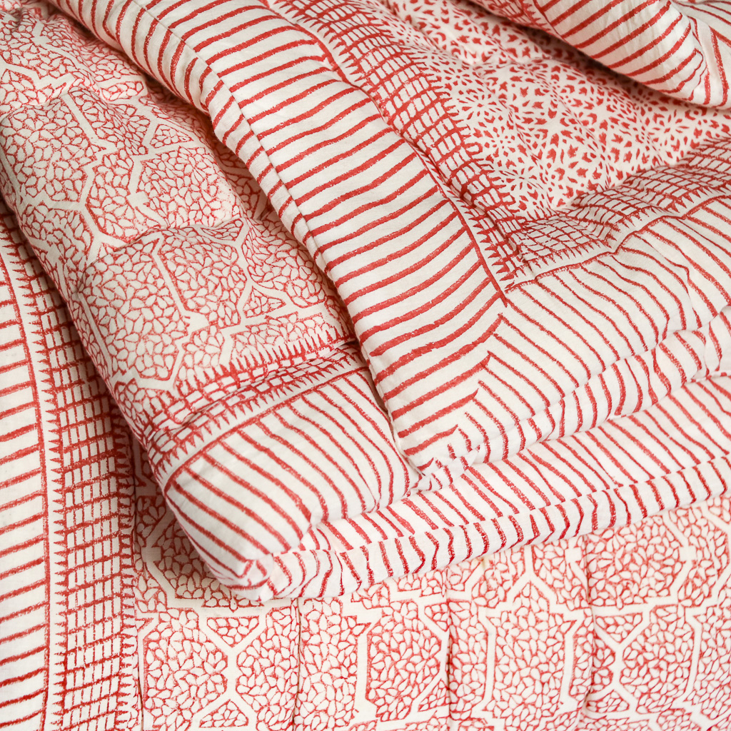 Kiki & Gautness Quilt in Ruby. Indian block print fabric. Indian block print. Block print quilts. Block print bedding.