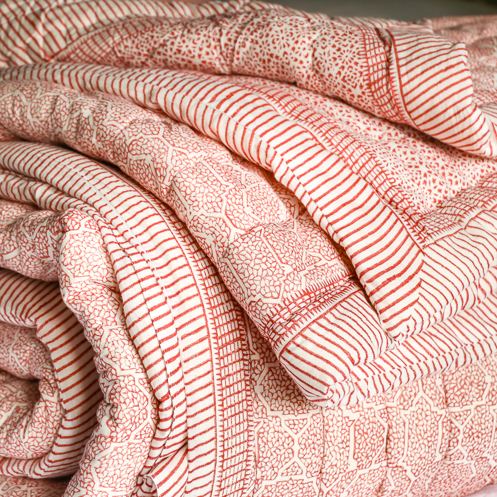 Kiki & Gautness Quilt in Ruby. Indian block print fabric. Indian block print. Block print quilts. Block print bedding.