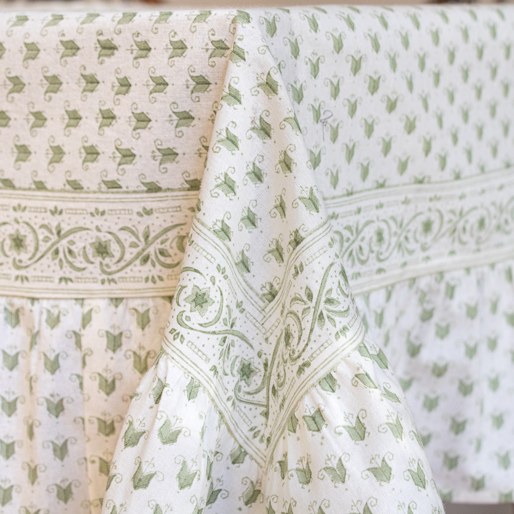 Livia Tablecloth in Sage shenouk, luxury table linen, table linen, tablecloths, block print tablecloths, indian block print, English block print, online shopping block print, online block print, floral tablecloths, green tablecloths, handmade table linen, organic cotton tablecloths, block print tablecloths, block print napkins, block print table linen, indian textiles