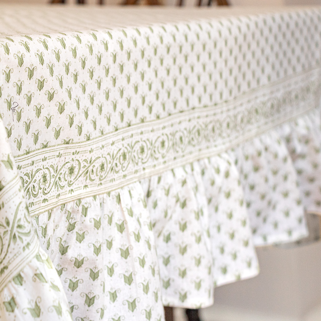 Livia Tablecloth in Sage shenouk, luxury table linen, table linen, tablecloths, block print tablecloths, indian block print, English block print, online shopping block print, online block print, floral tablecloths, green tablecloths, handmade table linen, organic cotton tablecloths, block print tablecloths, block print napkins, block print table linen, indian textiles